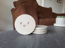 Load image into Gallery viewer, Cute Happy Coaster Set - 4 Smiley Face Concrete Drink Coasters - Rootshell Planters